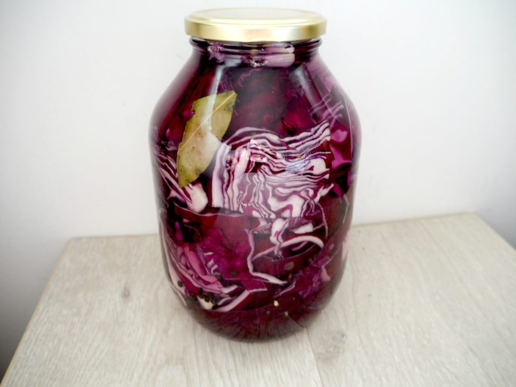 Bottle of lacto-fermented pickled red cabbage